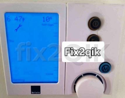 controller shows a spanner request for a service on a Brivis ducted central heating system