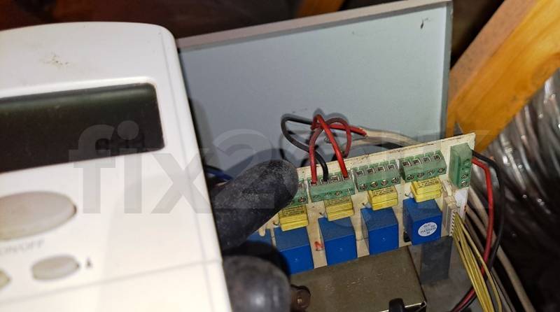 ducted-heating-service-checking-a-zone-control-pcb-on-a-climate-technology-ducted-heater